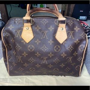 Authentic used Louis Vuitton speedy 25 tote